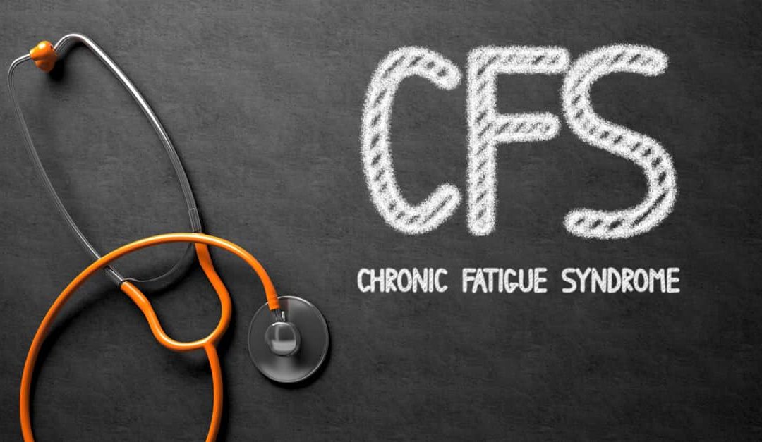 Chronic Fatigue Syndrome - Text on Black Chalkboard with Orange Stethoscope