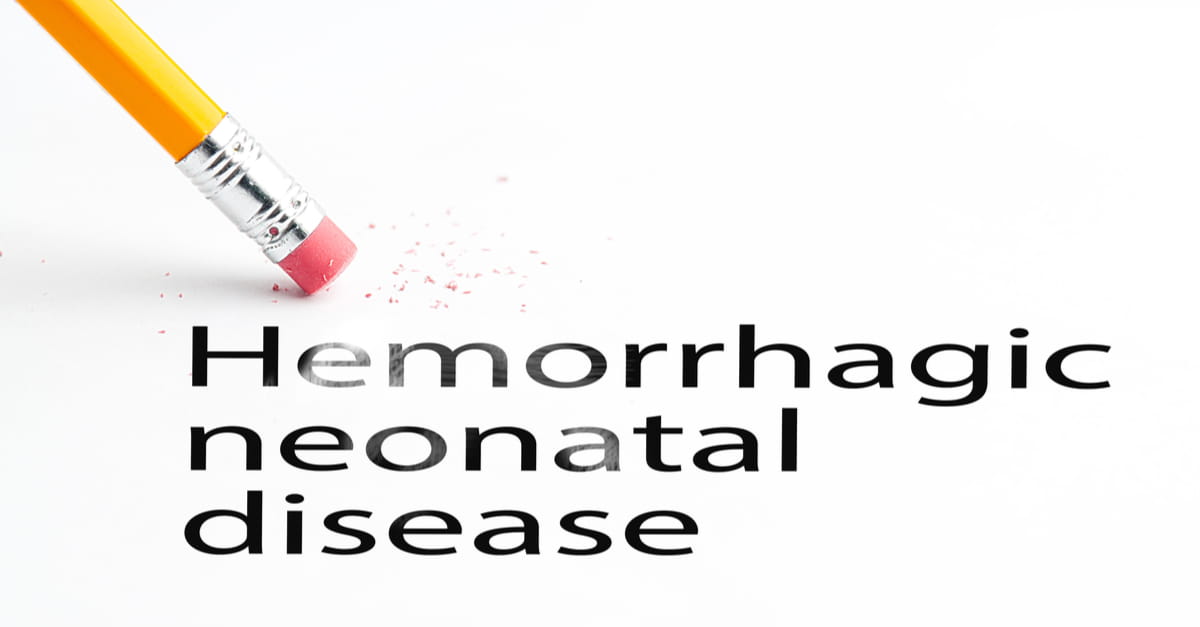 Closeup of pencil eraser and black hemorrhagic neonatal disease text.